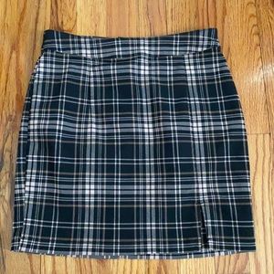 Garage tight skirt. Black and brown plaid. Size S slit